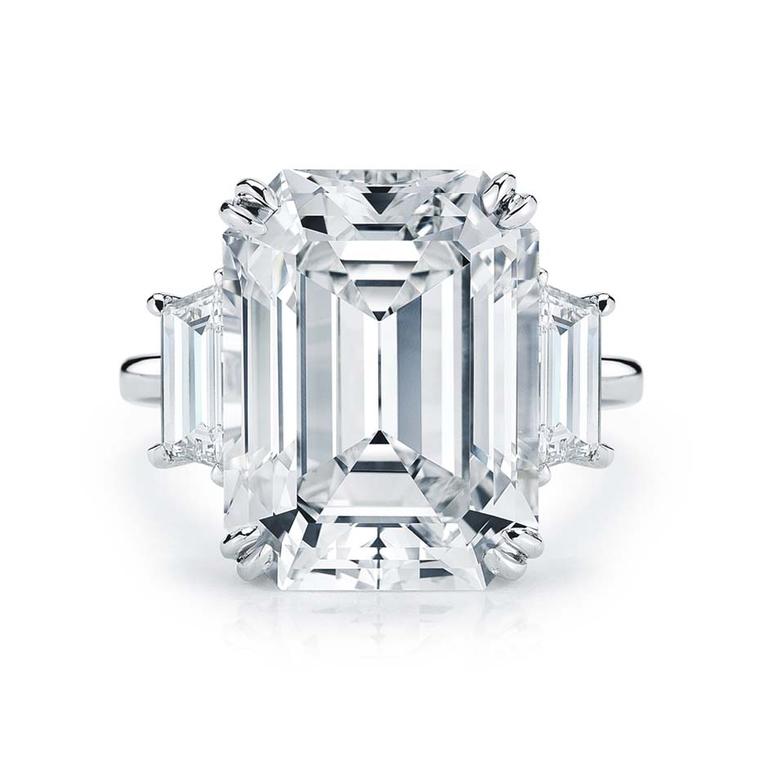 Kwiat 10.10ct emerald cut diamond ring with trapezoid side stones in platinum.